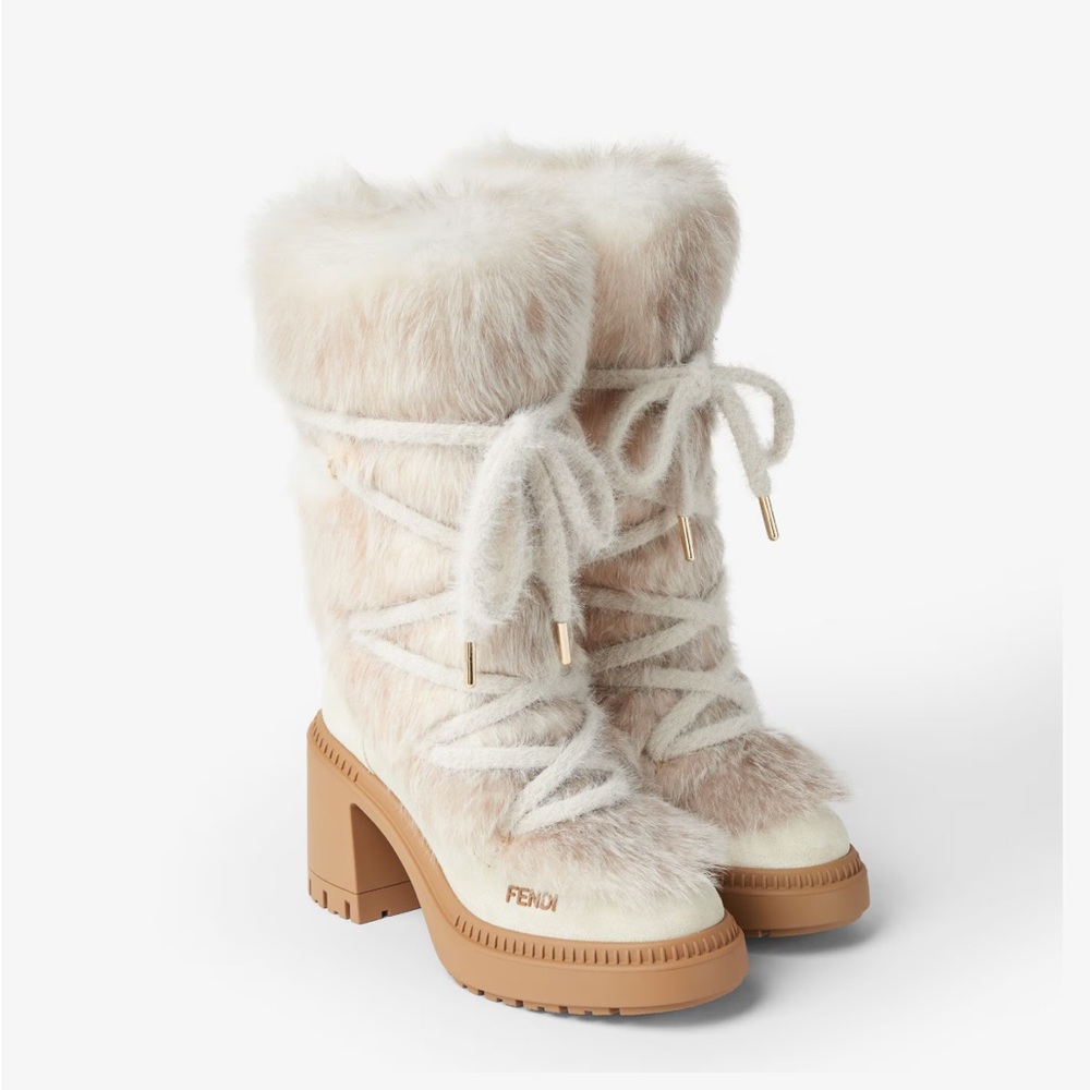 Fendi Apres Chic
Medium-heeled boots in white shearling and suede - Picture 4 of 5